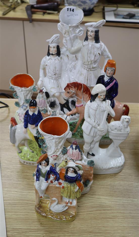 A collection of seven Victorian and later Staffordshire figures and vases